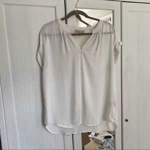 White and black polka dot blouse